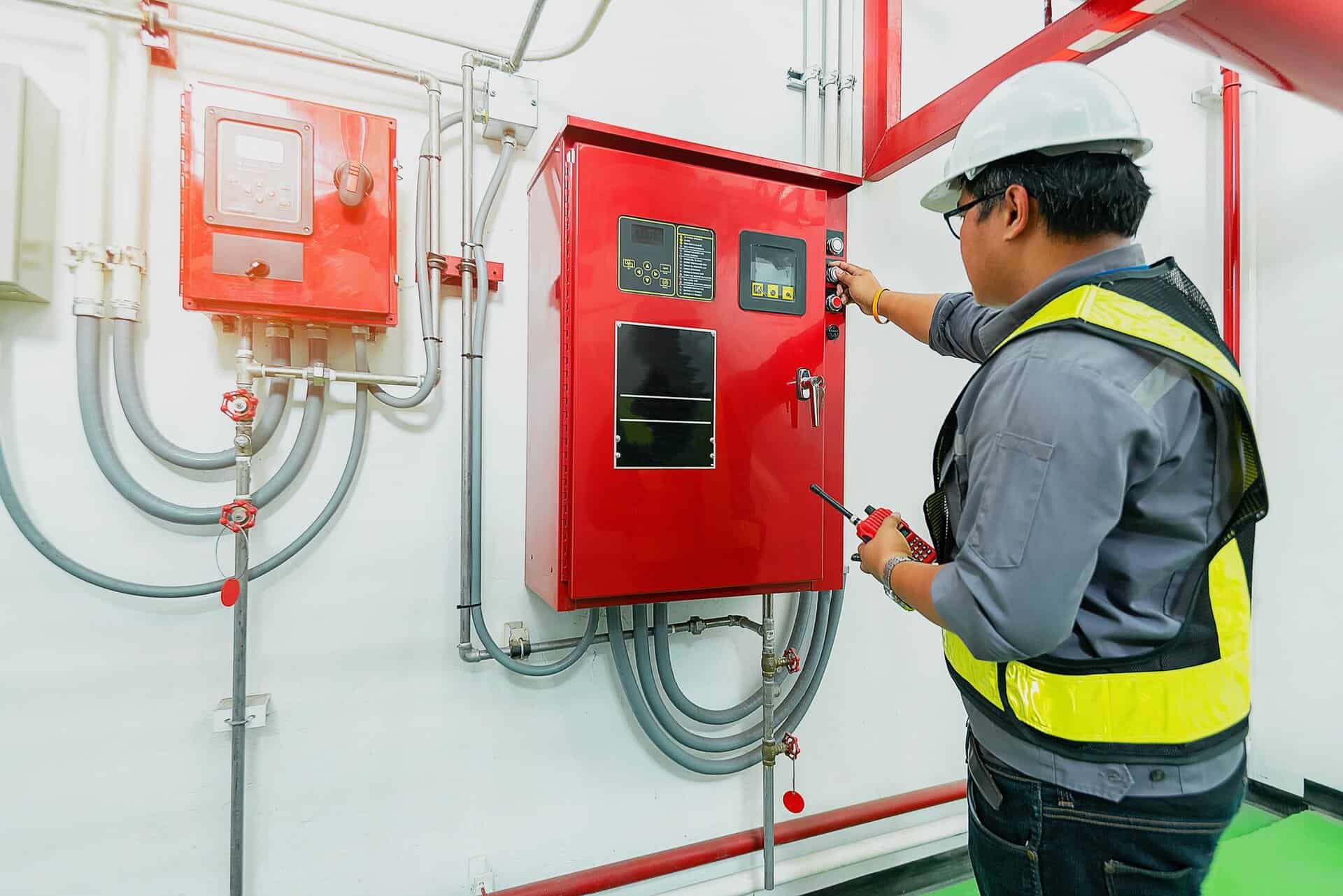 Fire engineer checking fire alarms
